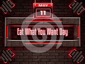 11 May, Eat What You Want Day, Neon Text Effect on Bricks Background