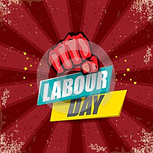 1 may Happy labour day vector label with strong protest fist in the air on bintage red background with rays. vector photo
