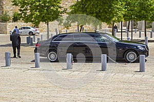 A large Mercedes Benz stretched limo parked outside the Yad Vashem Holocaust Museum in Jerusalem Israel