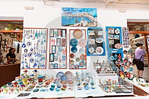 Greek ceramics and other souvenirs for sale at the streets of old town of Lindos. Greek traditional