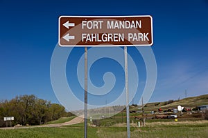 MAY 19 2019, MANDAN, NORTH DAKOTA, USA -  Road Sign points to historic Fort Mandan and Fahlgren Park, North Dakota photo