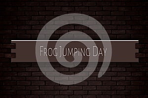 May month, day of May. Frog Jumping Day, on Bricks Background