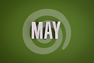 May sign lettering on solid background