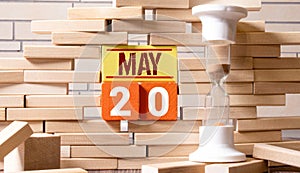 20 May text businrss concept, on wooden block.