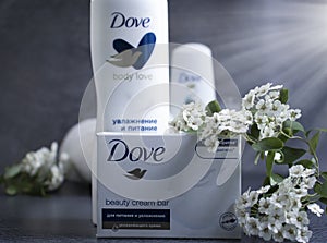 May 19, 2022 Ukraine city Kyiv soap, shampoo comfort  the Nivea company, a flower on a dark background