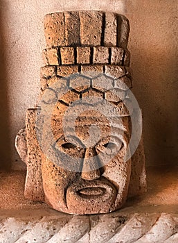 Mayan Aztec Carved Face in Stone photo