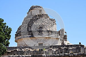 Mayan observatory in chichenitza pyramids in yucatan, mexico. photo
