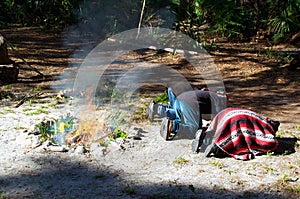 Mayan priests kissing ground photo