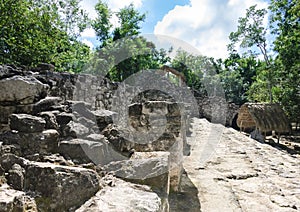Mayan ruins and hut