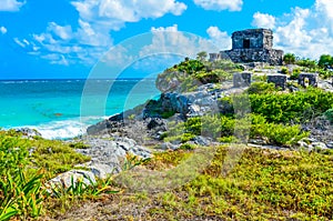 Mayan ruins of Tulum at tropical coast. God of Winds Temple at paradise beach. Mayan ruins of Tulum, Quintana Roo, Mexico