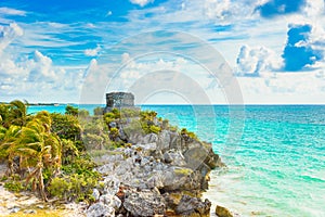 Mayan ruins of Tulum at tropical coast. God of Winds Temple at paradise beach. Mayan ruins of Tulum, Quintana Roo, Mexico