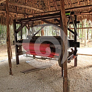 Mayan villagers weaving loom