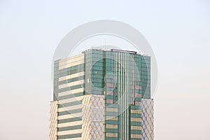 Mayapada Tower with the evening sky in the background, some of the glass looks dirty. Bandung photo