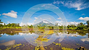 Mayon Volcano is an active stratovolcano in the province of Albay in Bicol Region, on the island of Luzon in the photo