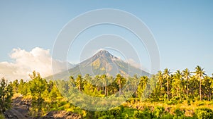 Mayon Volcano in Legazpi, Philippines. Mayon Volcano is an active volcano and rising 2462 meters from the shores of the photo