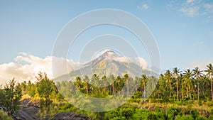 Mayon Volcano in Legazpi, Philippines. Mayon Volcano is an active volcano and rising 2462 meters from the shores of the photo