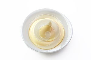 Mayonnaise in a dish isolated white background