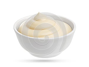 Mayonnaise in small bowl isolated on white background. photo