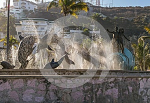 Sunlight in fountain of Monumento a La Continuidad de La Vida, Mazatlan, Mexico photo