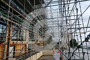 Maze of industrial construction scaffolding on building site