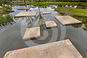 Maze of Stepping stones in pond