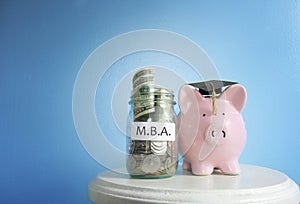 MBA piggy bank graduate photo