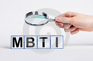 MBTI myers typology system analysis under magnifying lens. Psychology categories photo