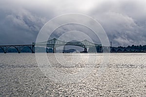 The McCullough Memorial Bridge crosses Coos bay on an overcast day near North Bend, Oregon, USA