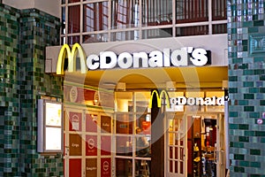 McDonald's logo, fastfood restaurant chain in building of South Station, American corporation food service