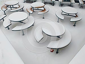 McDonalds tables in the snow in the city of Kiev photo
