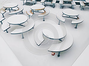 McDonalds tables in the snow in the city of Kiev photo