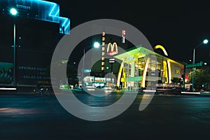 Mcdonals restaurant in the city at night