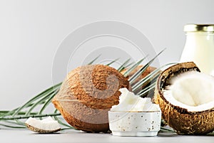 MCT Coconut butter or hard oil. Organic healthy food, beauty and SPA product. Gray background