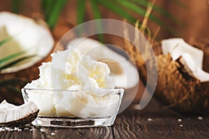 MCT Coconut butter or oil. Organic healthy food, beauty and SPA product. Wooden background. Copy space