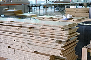 MDF boards stacked up inside factory workshop