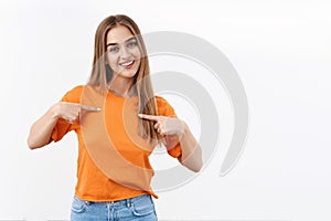 Me is all you need. Portrait of confident good-looking blonde girl pointing herself, smiling camera, talking personal