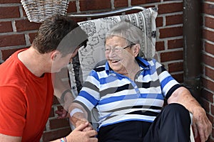 Me and grandma, boy takes care of his great-grandma