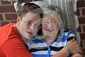 Me and grandma, boy takes care of his great-grandma