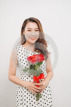 Is it for me. Waist up portrait of joyful young lady receiving red rose