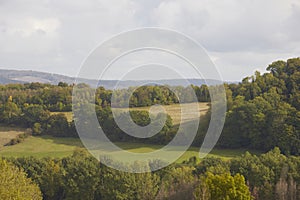 meadow with countryside hills in the background