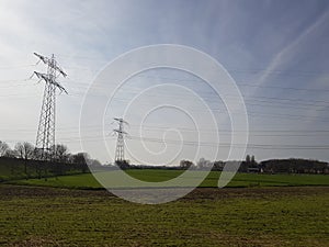 Meadow with high voltage power lines