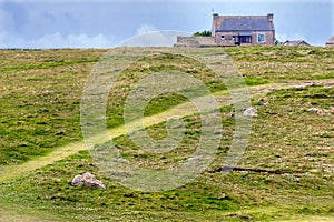 Meadow and house