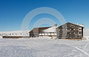 Meadow Hut , ski lodge, krkonose mountains Czech Republic. Winter sunny day