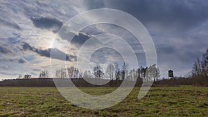 Meadow landscape with raised hide