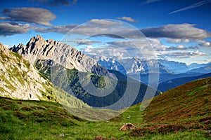 Meadows, flowers, jagged peaks and hazy valleys in Carnic Alps