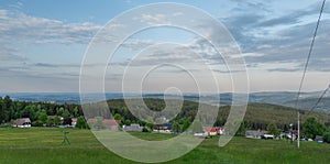 Meadows and forests near Javornik hill and village in Sumava national park