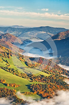 Meadows over Parnica village from Sip mountain during sunrise