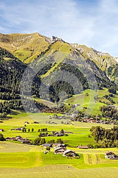 Meadows with wooden houses