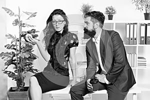 Meal break. Business couple enjoy office snack. Sensual girl and bearded man during work break. Snack break at workplace