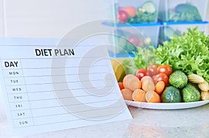 A meal plan for a week on a white table among set of plastic containers for food and food. Proper nutrition during the week